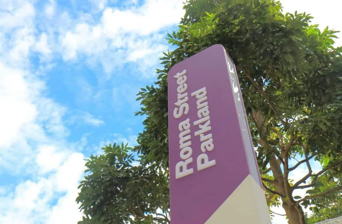 Roma Street Parkland sign highlighting area with subsidence and potential rising damp risks.